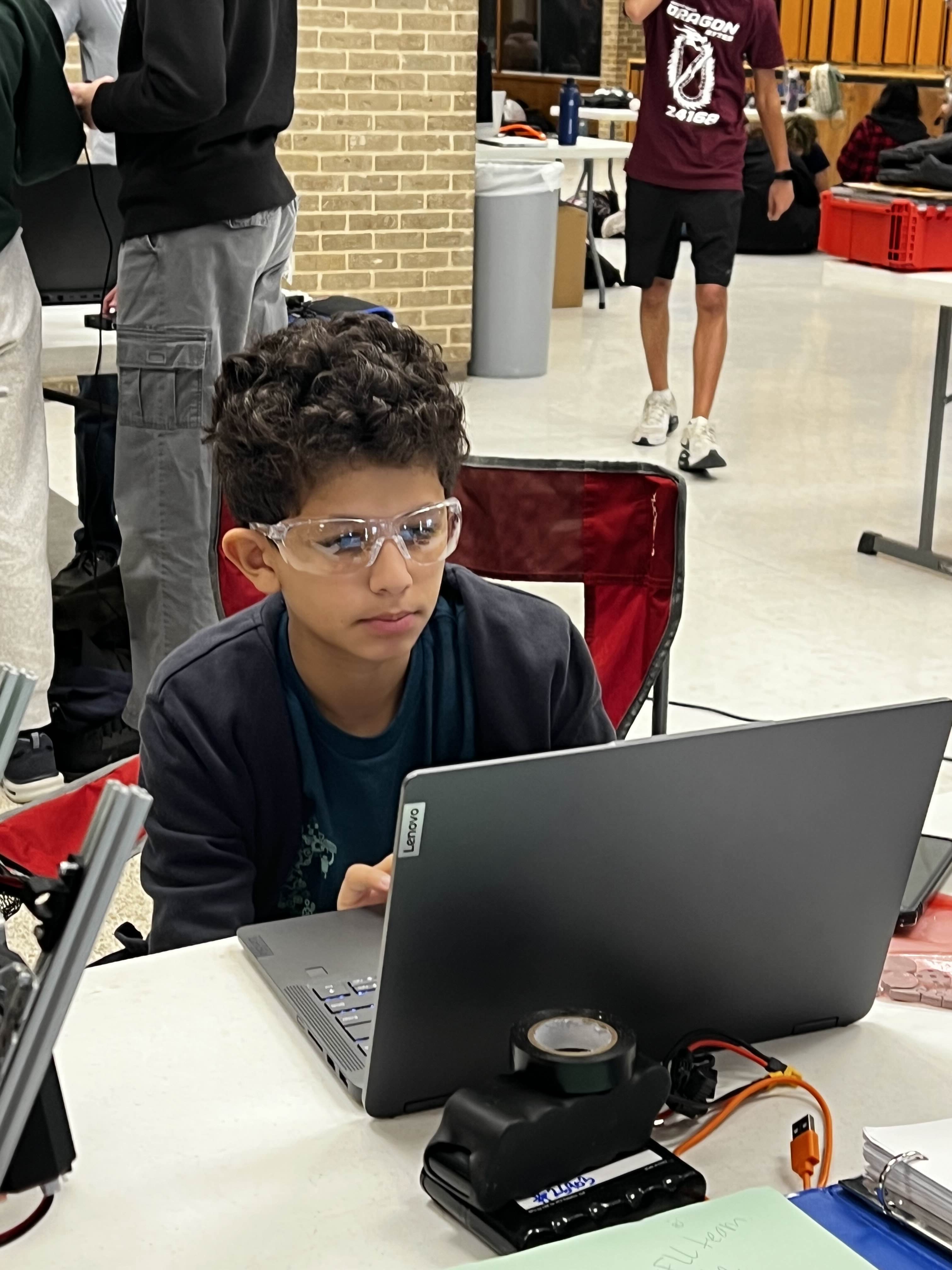 Me working on code during the league competition (2025)